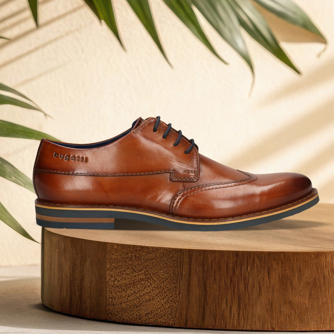 Men's Bugatti derby cognac leather shoes with a round toe and wing tip featuring a stacked heel , a eva outsole , and laces fastening.