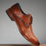 A cognac Men's bugatti Derby featuring a pointed toe plain toe, stacked heel. Made from premium genuine leather with a durable leather outsole, this laces design offers both style and comfort.