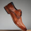 A cognac Men's bugatti Derby featuring a pointed toe plain toe, stacked heel. Made from premium genuine leather with a durable leather outsole, this laces design offers both style and comfort.