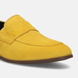 Men's Bugatti penny loafer yellow leather shoes with a round toe and apron toe featuring a stacked heel , a tpr outsole.