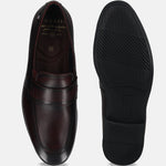 Men's Bugatti penny loafer red leather shoes with a round toe and apron toe featuring a stacked heel , a tpr outsole.