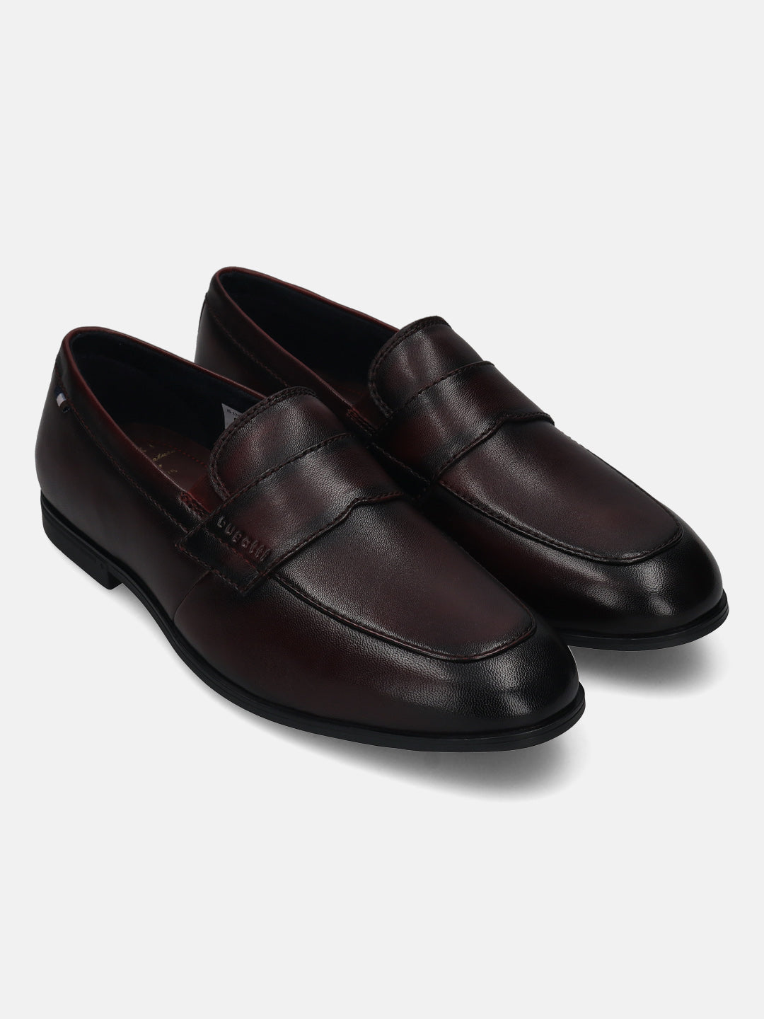 Men's Bugatti penny loafer red leather shoes with a round toe and apron toe featuring a stacked heel , a tpr outsole.