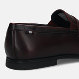 Men's Bugatti penny loafer red leather shoes with a round toe and apron toe featuring a stacked heel , a tpr outsole.