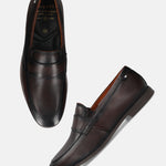 Men's Bugatti penny loafer brown leather shoes with a round toe and apron toe featuring a stacked heel , a tpr outsole.