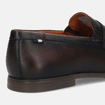 Men's Bugatti penny loafer brown leather shoes with a round toe and apron toe featuring a stacked heel , a tpr outsole.