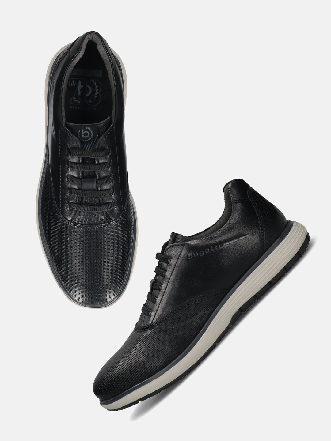 Men's Bugatti lifestyle black leather shoes with a round toe , a eva outsole , and laces fastening.