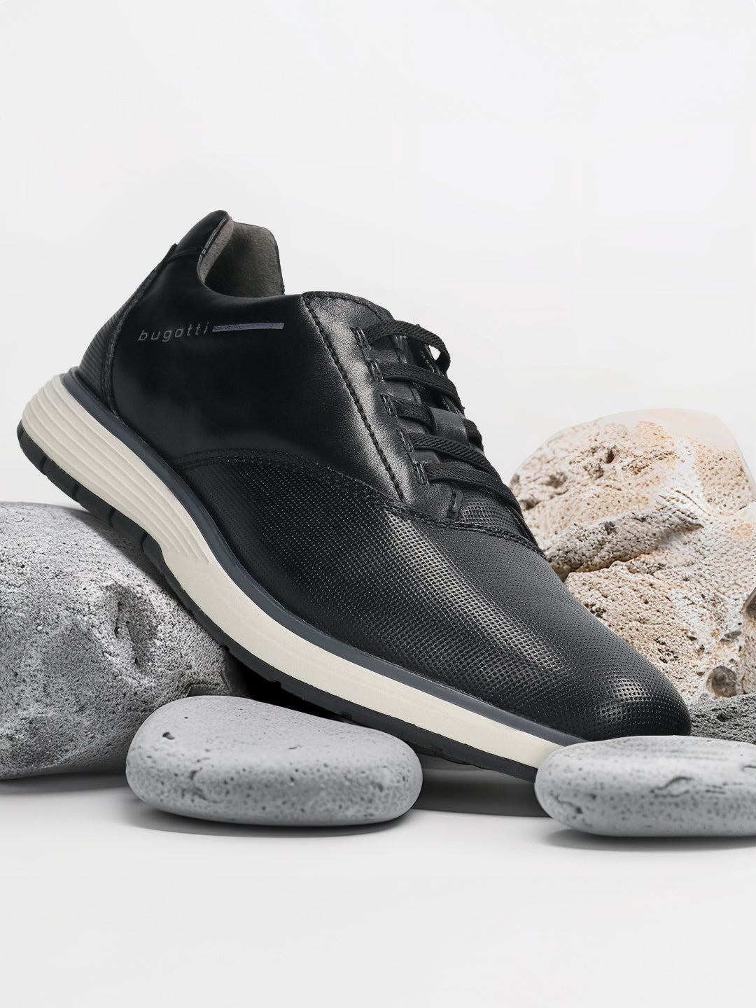 Men's Bugatti lifestyle black leather shoes with a round toe , a eva outsole , and laces fastening.