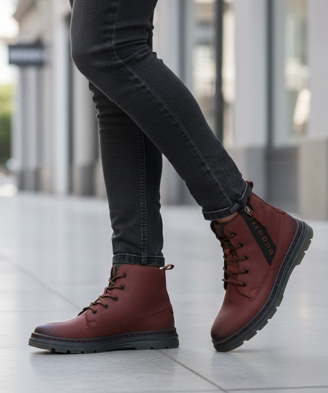 Cropped lifestyle shot of bugatti Drake Bordo boots, featuring red premium leather, lace-up closure, and a comfortable, casual style.
