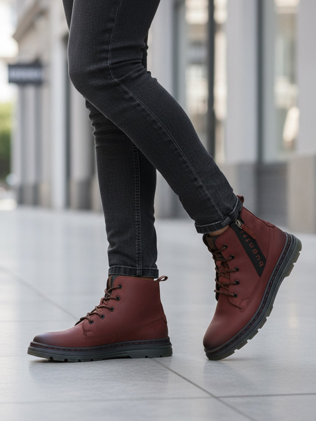Cropped lifestyle shot of bugatti Drake Bordo boots, featuring red premium leather, lace-up closure, and a comfortable, casual style.
