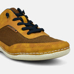 A yellow Men's bugatti Sneakers featuring a round plain toe, zero heels heel. Made from synthetic with a durable tpr outsole, this laces design offers both style and comfort.