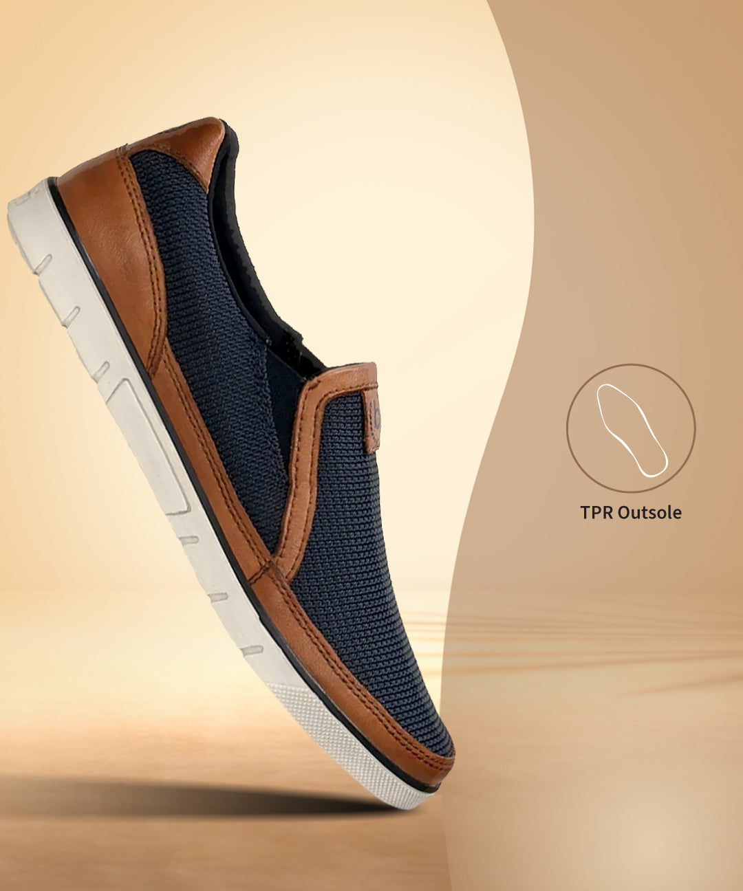 Bugatti Pacific dark blue comfort slip-on shoe, with brown accents and a white sole, shown at an angle.
