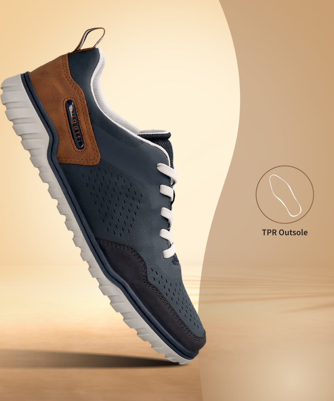 Bugatti Samana dark blue comfort sneaker with white laces, brown and blue leather, and a ridged white sole.
