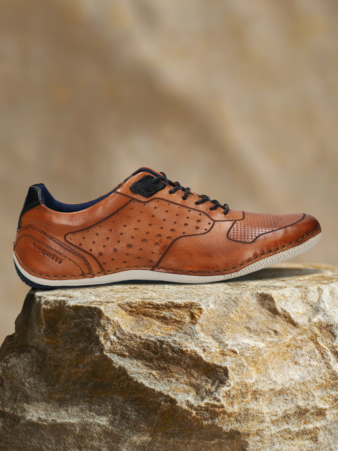 Men's Bugatti stitched cognac leather shoes with a round toe , a tpr outsole , and laces fastening.