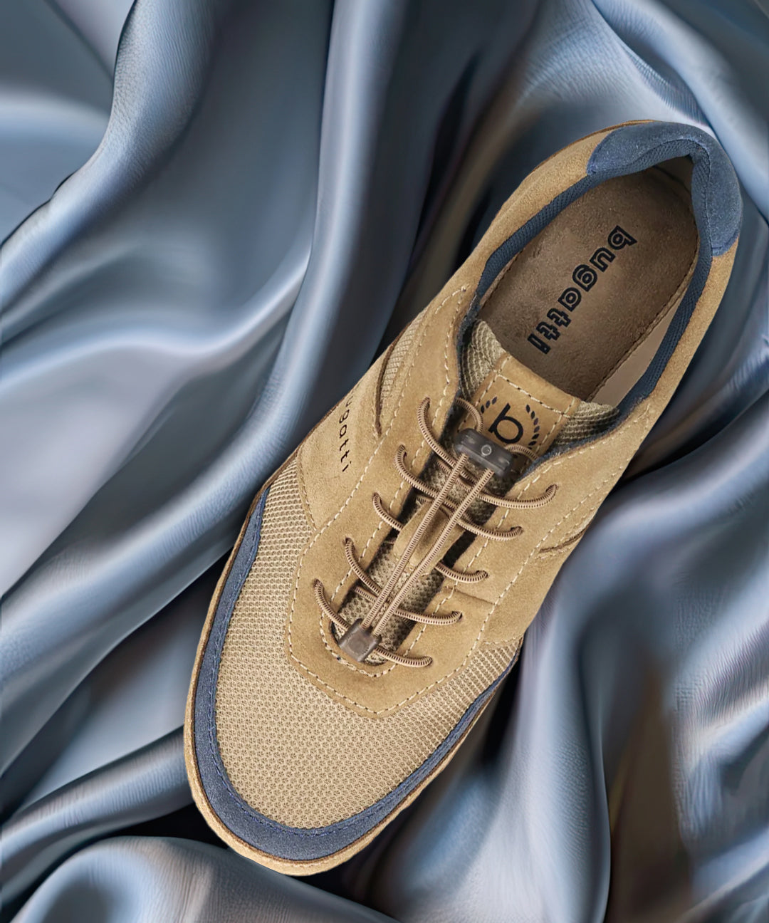 A brown Men's bugatti Sneakers featuring a round toe plain toe, zero heels heel. Made from premium genuine leather with a durable sebs (block copolymer) outsole, this elastic design offers both style and comfort.