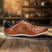 A cognac Men's bugatti Sneakers featuring a round toe plain toe, zero heels heel. Made from premium genuine leather with a durable sebs (block copolymer) outsole, this elastic design offers both style and comfort.