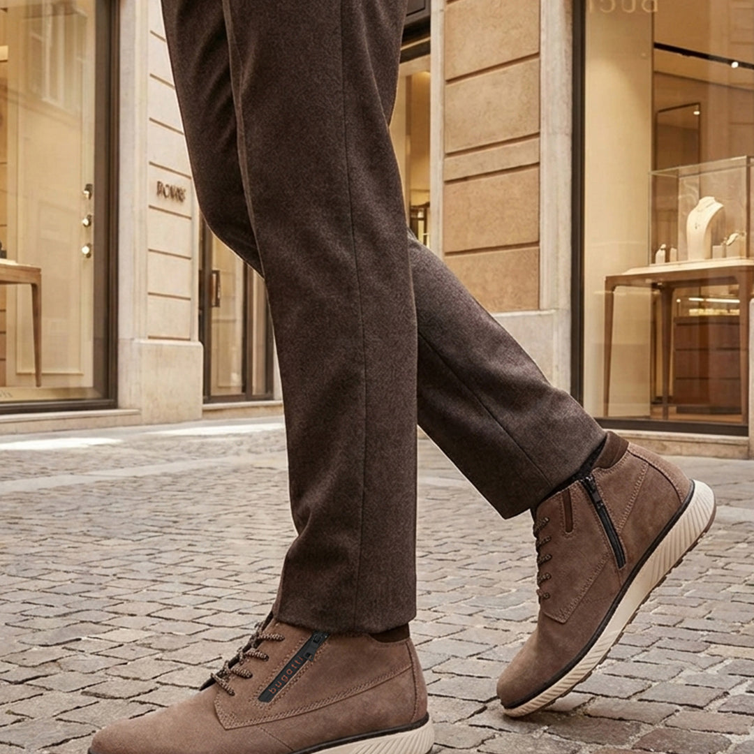 Lifestyle shot of bugatti Pramo Taupe premium leather comfort sneakers with zipper detail.
