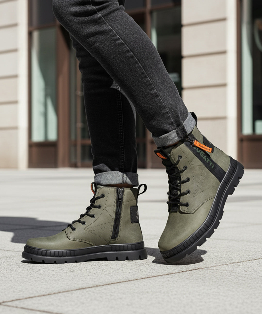 Lifestyle shot of bugatti Pallario comfort casual boots in dark green leather with black laces and soles.