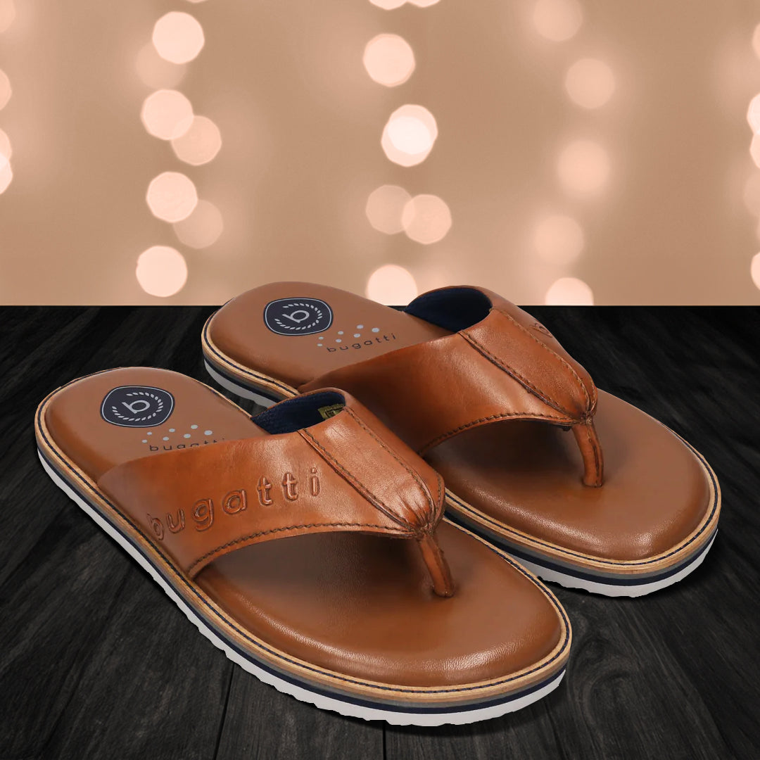 A cognac Men's bugatti Thongs featuring a open toe plain toe, zero heels heel, and a wide fit. Made from premium genuine leather with a durable eva outsole, this slip-on design offers both style and comfort.