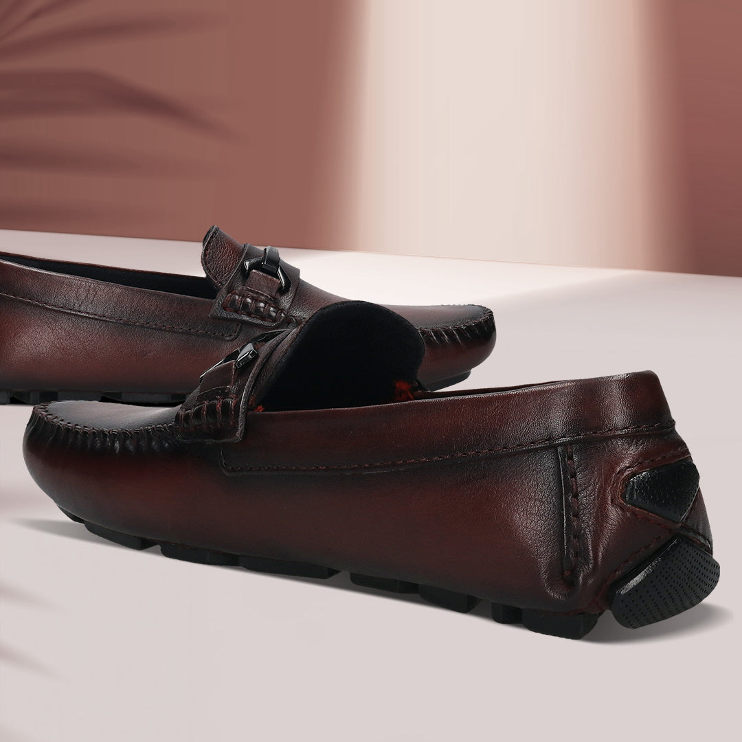 Men's Bugatti drivers red leather shoes with a round toe and apron toe , a rubber outsole.