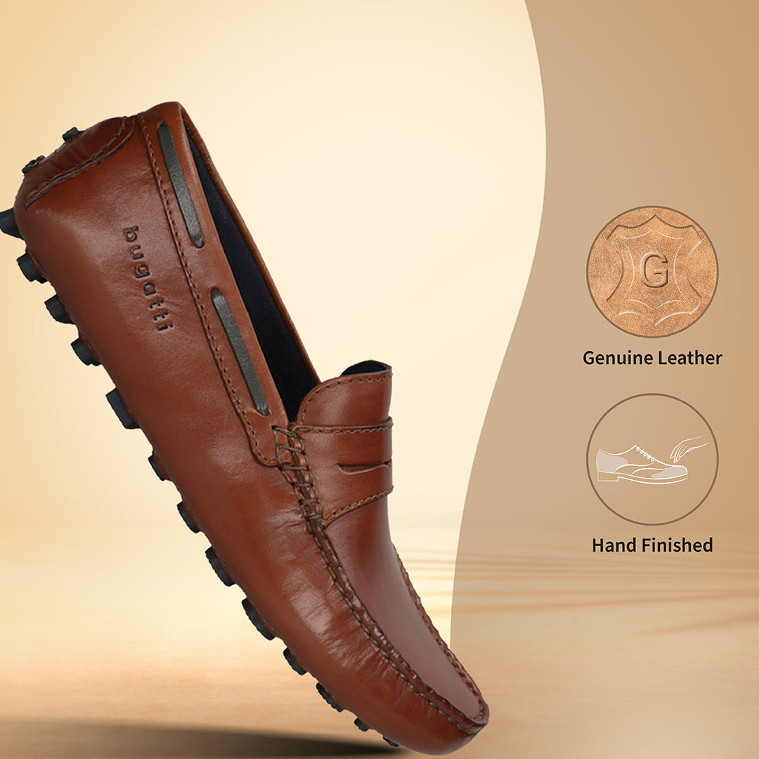 Men's Bugatti drivers cognac leather shoes with a round toe and apron toe , a tpr outsole.