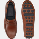 Men's Bugatti drivers cognac leather shoes with a round toe and apron toe , a tpr outsole.