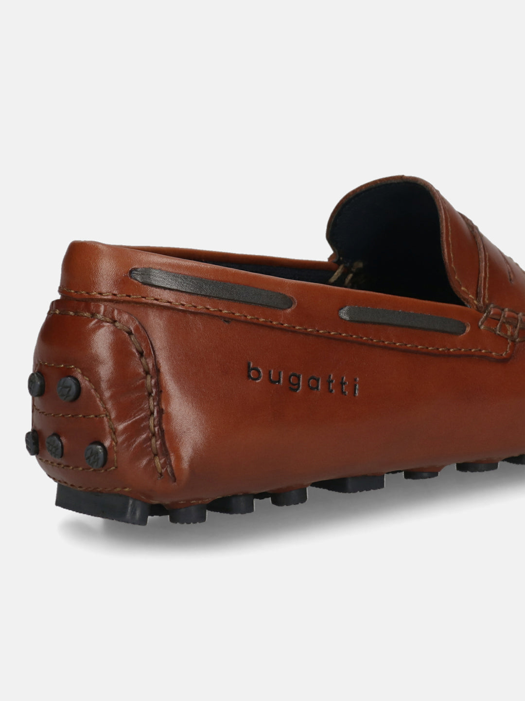 Men's Bugatti drivers cognac leather shoes with a round toe and apron toe , a tpr outsole.