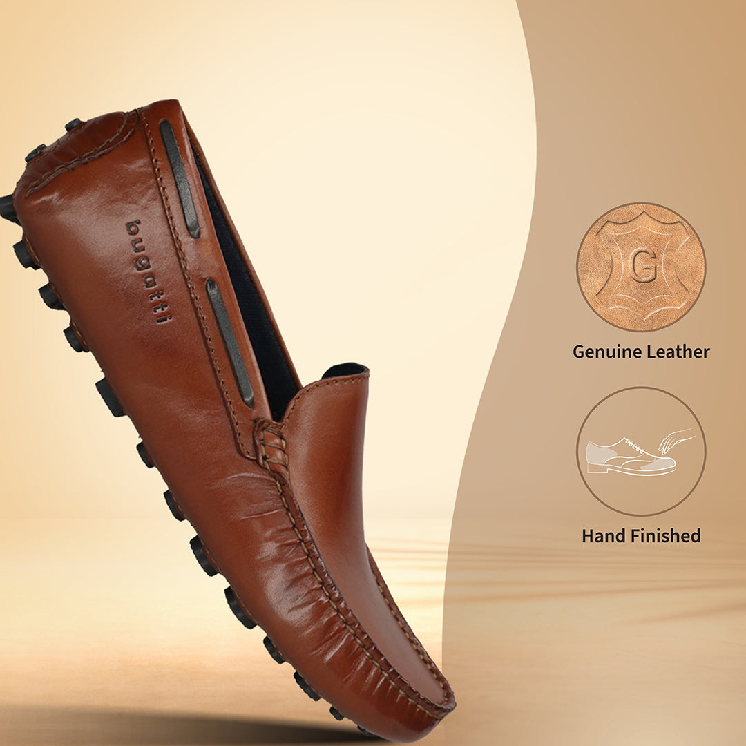 Men's Bugatti drivers cognac leather shoes with a round toe and apron toe , a tpr outsole.