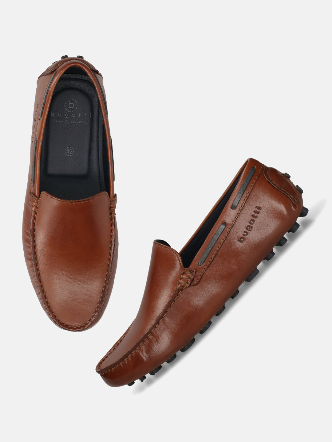Men's Bugatti drivers cognac leather shoes with a round toe and apron toe , a tpr outsole.