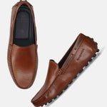 Men's Bugatti drivers cognac leather shoes with a round toe and apron toe , a tpr outsole.
