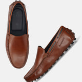 Men's Bugatti drivers cognac leather shoes with a round toe and apron toe , a tpr outsole.