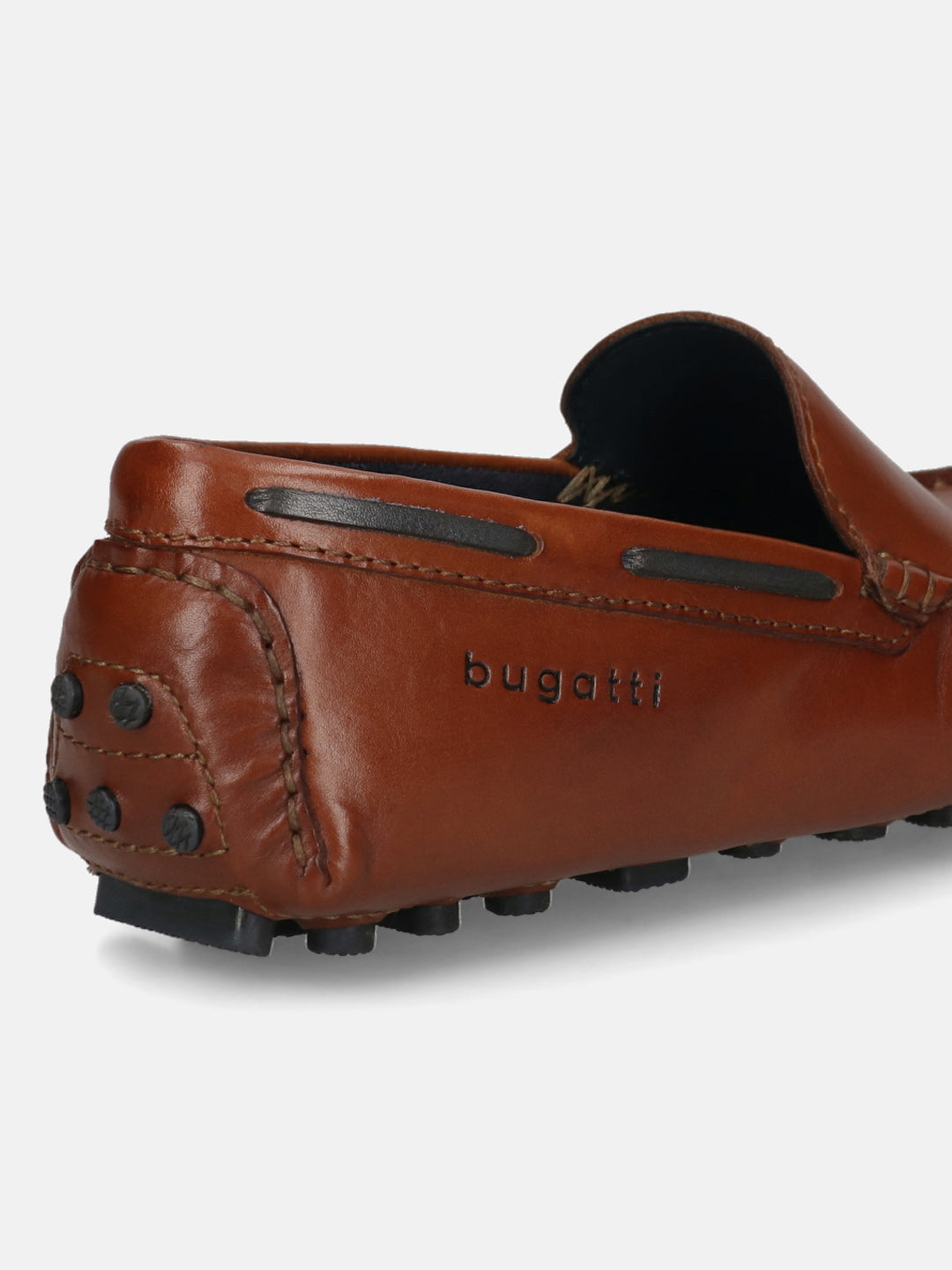 Men's Bugatti drivers cognac leather shoes with a round toe and apron toe , a tpr outsole.