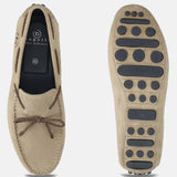 Men's Bugatti drivers beige leather shoes with a round toe and apron toe , a tpr outsole.