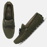 Men's Bugatti drivers green leather shoes with a round toe and apron toe , a tpr outsole.