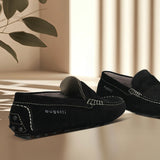 Men's Bugatti drivers black leather shoes with a round toe and apron toe , a tpr outsole.