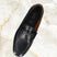 A black Men's bugatti Drivers featuring a round toe apron toe, zero heels heel. Made from premium genuine leather with a durable rubber outsole, this slip-on design offers both style and comfort.