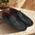 A black Men's bugatti Drivers featuring a round toe apron toe, zero heels heel. Made from premium genuine leather with a durable rubber outsole, this slip-on design offers both style and comfort.