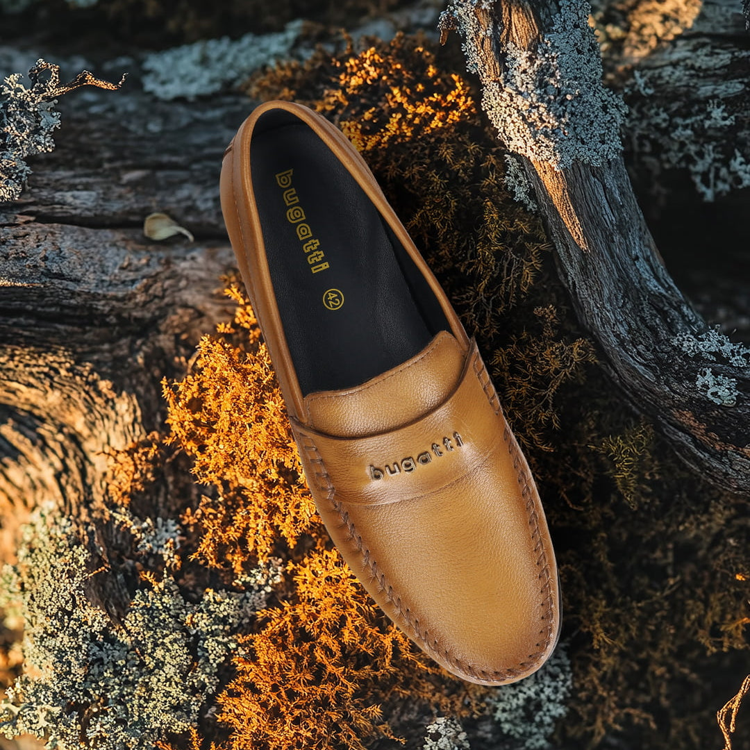 Men's Bugatti drivers yellow leather shoes with a round toe and apron toe , a tpr outsole.