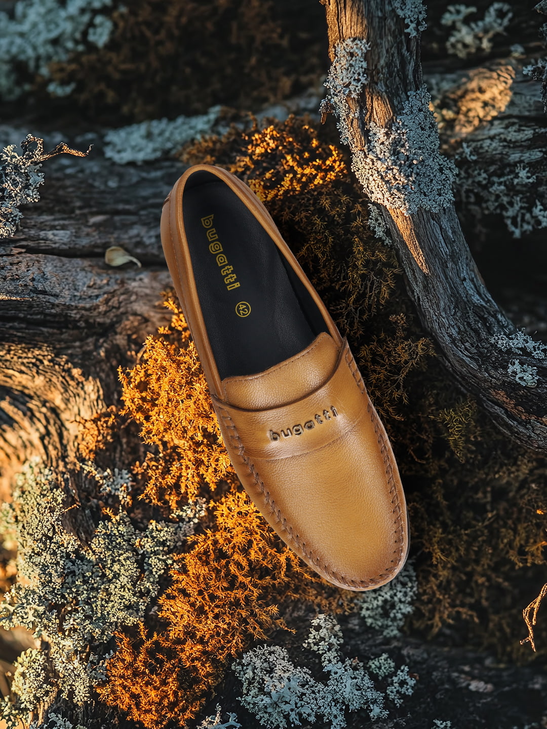 Men's Bugatti drivers yellow leather shoes with a round toe and apron toe , a tpr outsole.