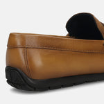 Men's Bugatti drivers yellow leather shoes with a round toe and apron toe , a tpr outsole.