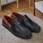 Men's Bugatti drivers blue leather shoes with a round toe and apron toe , a tpr outsole.