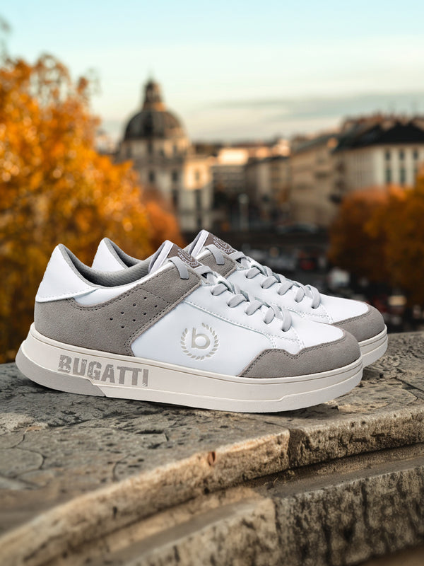 A white Men's bugatti Sneakers featuring a round plain toe, zero heels heel. Made from suede leather with a durable tpr outsole, this laces design offers both style and comfort.