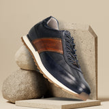 Men's Bugatti leather blue leather shoes with a round toe , a tpr outsole , and laces fastening.