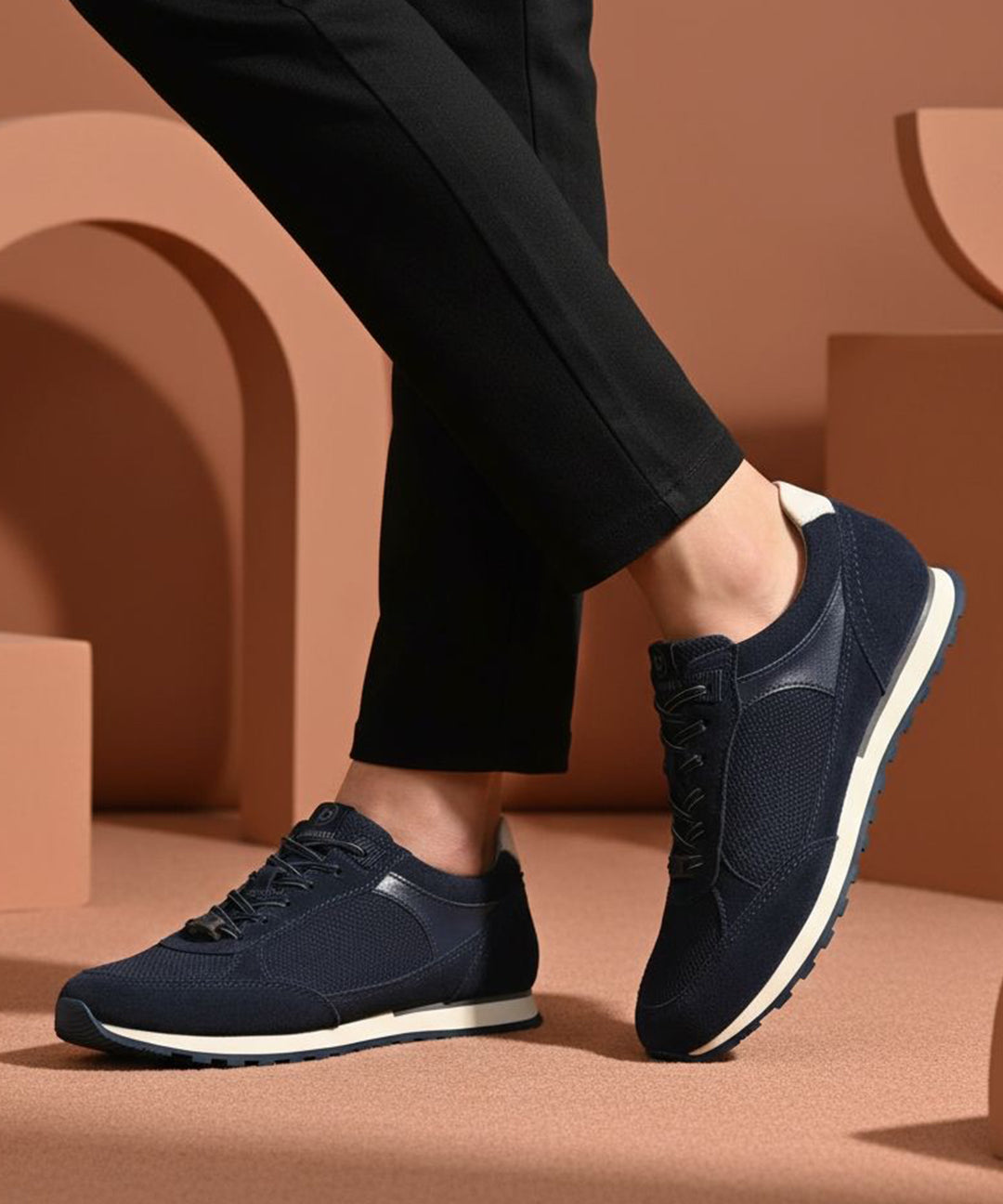 bugatti Ivar dark blue sneakers with premium leather accents, white midsoles, and dark laces.
