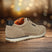 Men's Bugatti leather beige leather shoes with a round toe , a tpr outsole , and laces fastening.