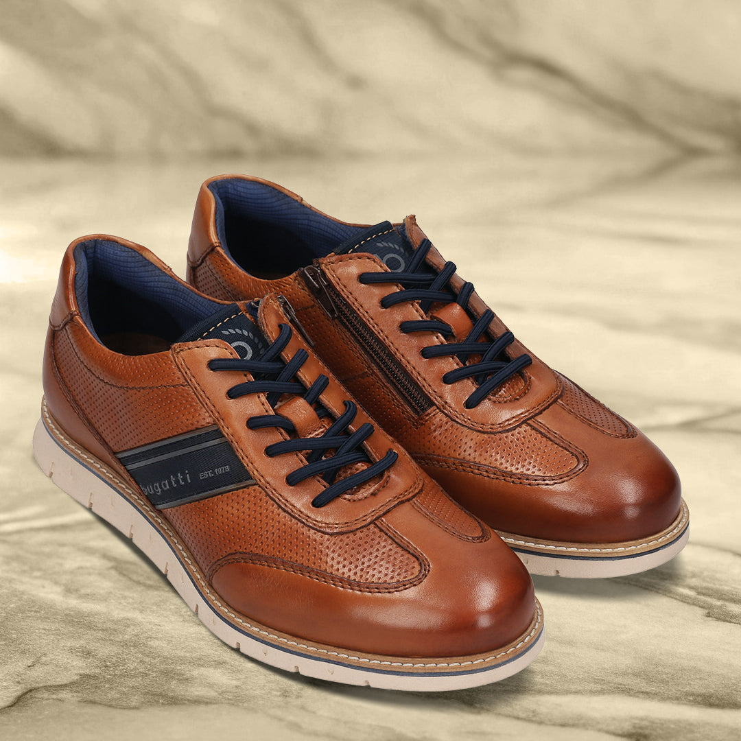 Men's Bugatti leather cognac leather shoes with a round toe , a tpr outsole , and laces fastening.