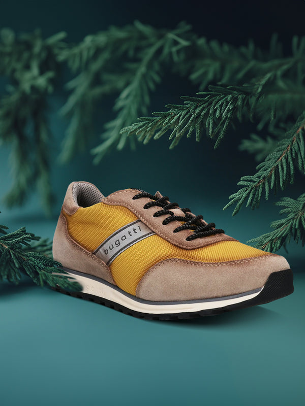 A yellow Men's bugatti Sneakers featuring a round plain toe, zero heels heel. Made from suede leather with a durable tpr outsole, this laces design offers both style and comfort.