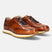 A cognac Men's bugatti Sneakers featuring a round  plain toe, zero heels heel. Made from premium genuine leather with a durable eva outsole, this laces design offers both style and comfort.