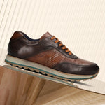 A brown Men's bugatti Sneakers featuring a round toe plain toe, zero heels heel. Made from premium genuine leather with a durable eva outsole, this laces design offers both style and comfort.