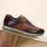 A brown Men's bugatti Sneakers featuring a round toe plain toe, zero heels heel. Made from premium genuine leather with a durable eva outsole, this laces design offers both style and comfort.