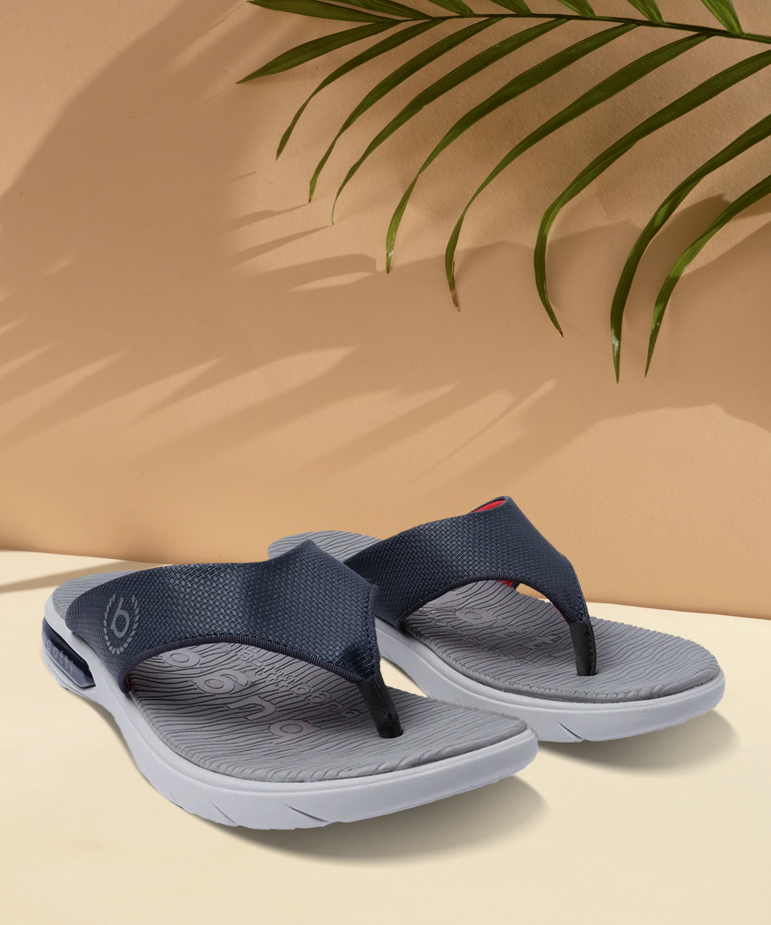 A blue Men's bugatti Thongs featuring a round open toe, zero heels heel. Made from synthetic with a durable eva outsole, this slip-on design offers both style and comfort.